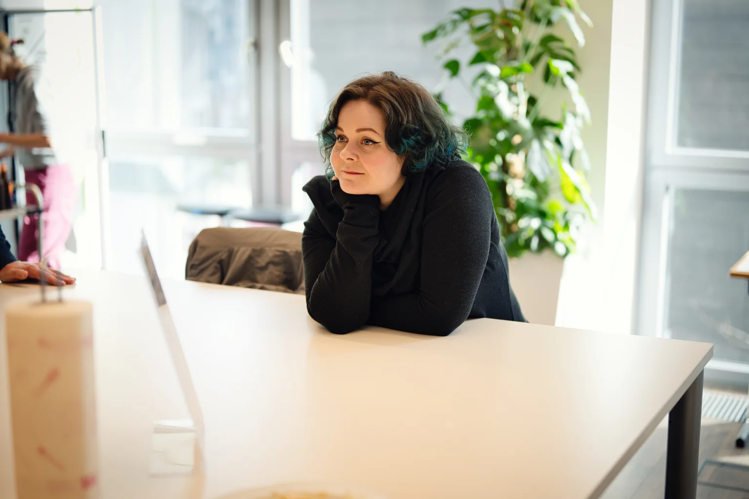 A how.fm team member reflecting during a workshop