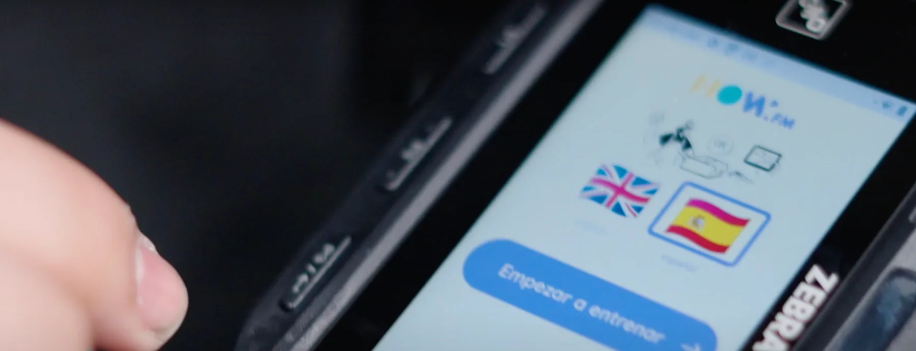 Language selection in the how.fm app on a ColdTrack handheld device