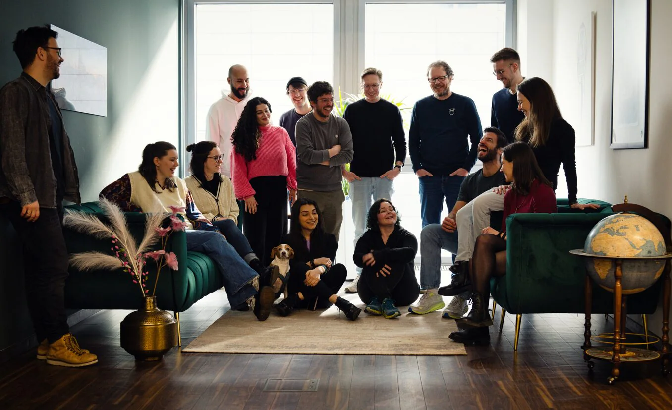 The how.fm team together in the Cologne office